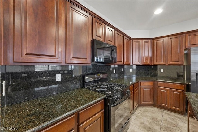 924 Crescent Falls St, Henderson, NV 89011 - kitchen featuring black appliances, decorative backsplash, dark stone countertops, and light tile patterned floors