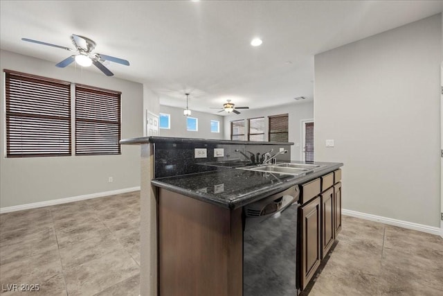 924 Crescent Falls St, Henderson, NV 89011 - kitchen with black dishwasher, ceiling fan, a kitchen island with sink, dark brown cabinetry, and recessed lighting