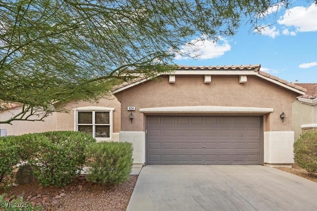 924 Crescent Falls St, Henderson, NV 89011 - view of front of property with a garage, concrete driveway, and stucco siding