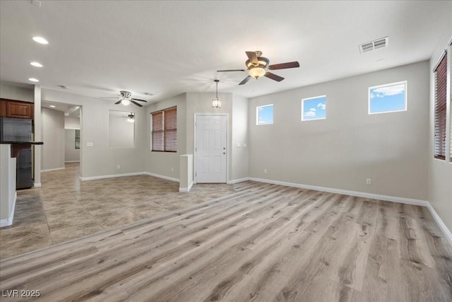 924 Crescent Falls St, Henderson, NV 89011 - unfurnished living room with a ceiling fan, recessed lighting, and light wood-type flooring