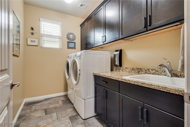 1860 Moonbow Falls St, Henderson, NV 89044 - laundry area featuring cabinet space and washing machine and dryer