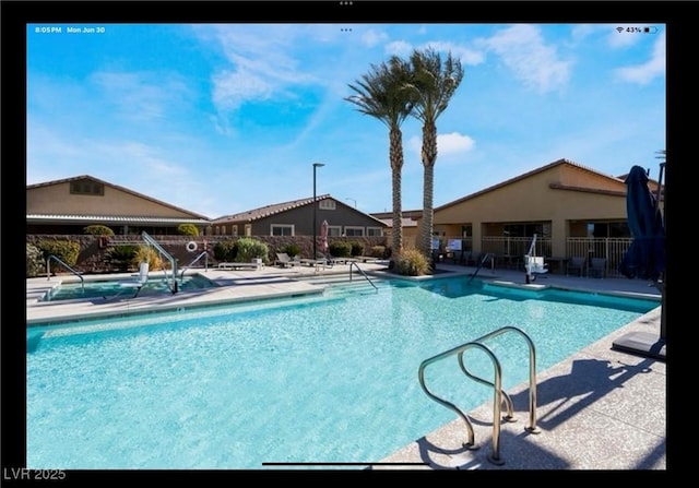 1860 Moonbow Falls St, Henderson, NV 89044 - community pool with a patio