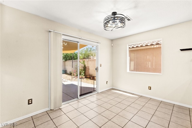 6044 Seneca Springs St, Las Vegas, NV 89130 - unfurnished room featuring baseboards and light tile patterned floors