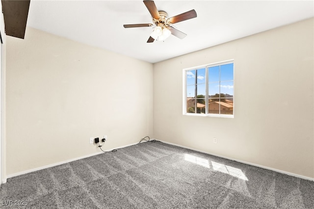 6044 Seneca Springs St, Las Vegas, NV 89130 - carpeted spare room with ceiling fan and baseboards