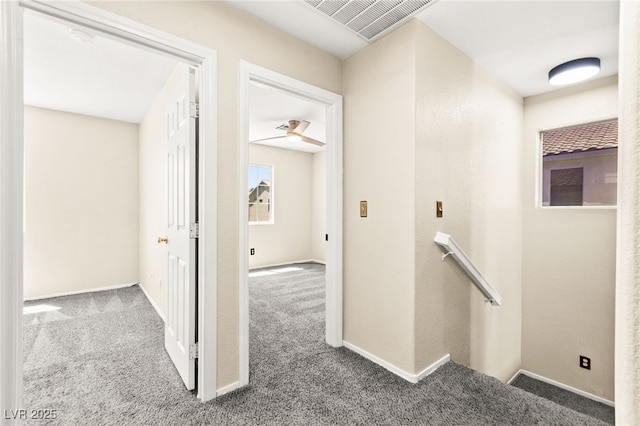 6044 Seneca Springs St, Las Vegas, NV 89130 - hallway with an upstairs landing and carpet flooring