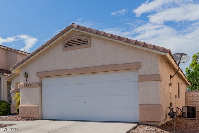 8840 Spinning Wheel Ave, Las Vegas, NV 89143 - garage with driveway