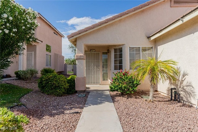 8840 Spinning Wheel Ave, Las Vegas, NV 89143 - property entrance with stucco siding