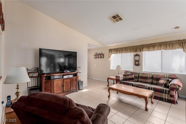 8840 Spinning Wheel Ave, Las Vegas, NV 89143 - living area featuring light tile patterned flooring and vaulted ceiling