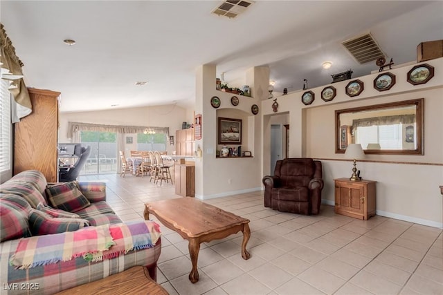 8840 Spinning Wheel Ave, Las Vegas, NV 89143 - living room with lofted ceiling and light tile patterned floors