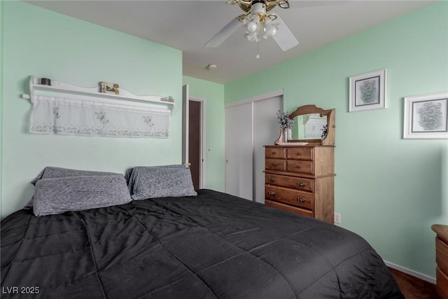 8840 Spinning Wheel Ave, Las Vegas, NV 89143 - bedroom with a closet, a ceiling fan, and carpet