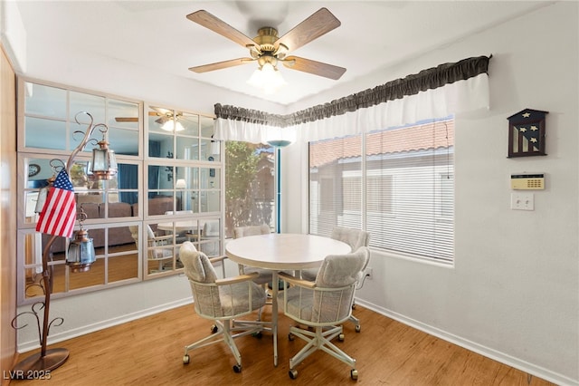 3152 Tarpon Dr Unit 203, Las Vegas, NV 89120 - dining area featuring wood finished floors and a ceiling fan