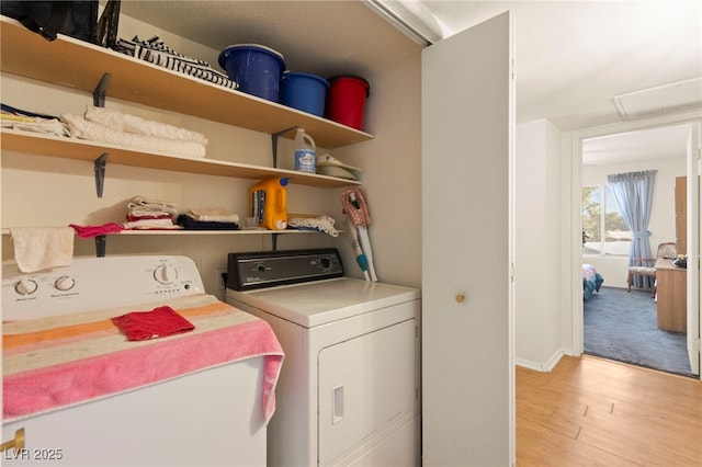 3152 Tarpon Dr Unit 203, Las Vegas, NV 89120 - washroom featuring washing machine and dryer and light wood-style floors