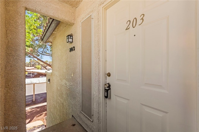 3152 Tarpon Dr Unit 203, Las Vegas, NV 89120 - property entrance featuring stucco siding
