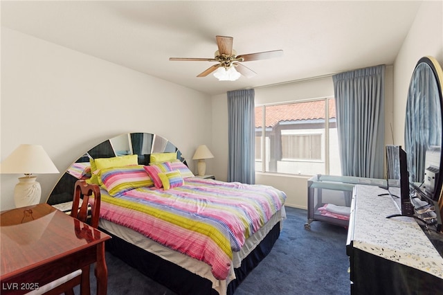 3152 Tarpon Dr Unit 203, Las Vegas, NV 89120 - bedroom featuring dark carpet and ceiling fan