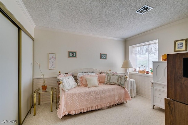 1939 Guinn Dr, Henderson, NV 89074 - carpeted bedroom featuring ornamental molding, a textured ceiling, and a closet