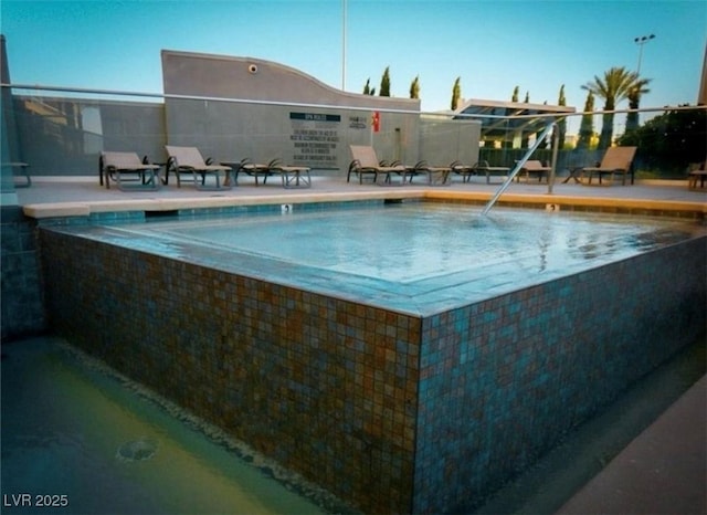 4575 Dean Martin Dr Unit 406, Las Vegas, NV 89103 - community pool with a patio area