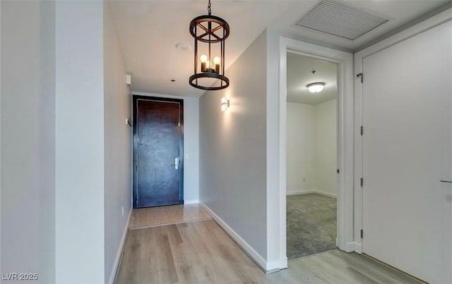 4575 Dean Martin Dr Unit 406, Las Vegas, NV 89103 - hallway with light wood-style floors and baseboards