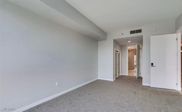 4575 Dean Martin Dr Unit 406, Las Vegas, NV 89103 - carpeted empty room featuring baseboards