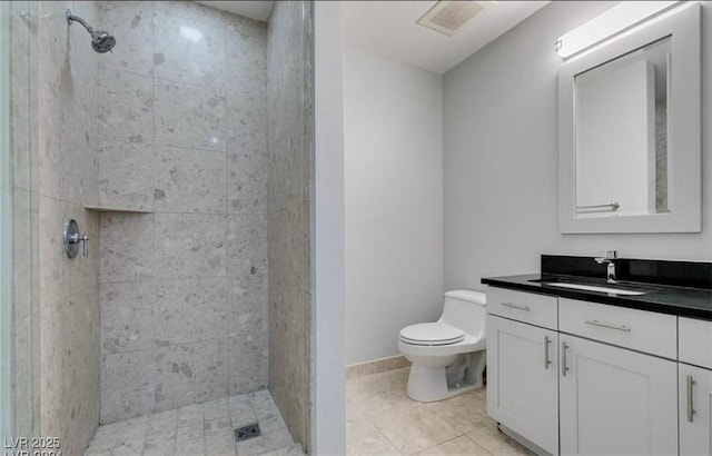 4575 Dean Martin Dr Unit 406, Las Vegas, NV 89103 - full bathroom with vanity, a tile shower, and tile patterned floors