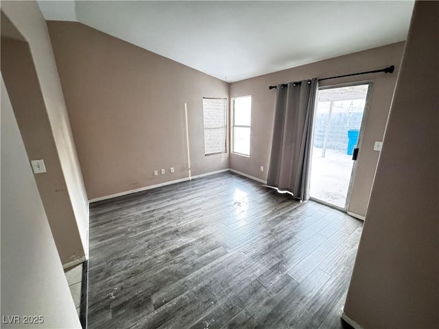 5513 Oakwood Ridge St, Las Vegas, NV 89130 - spare room with wood finished floors and vaulted ceiling