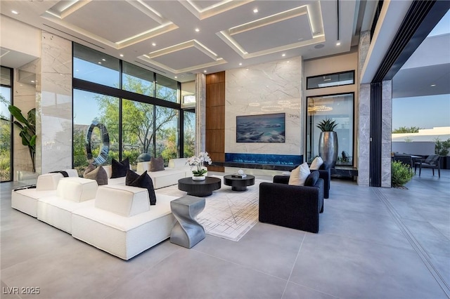 10891 Stardust Dr, Las Vegas, NV 89135 - building lobby with floor to ceiling windows, a towering ceiling, and recessed lighting