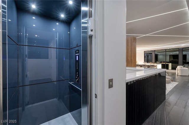 10891 Stardust Dr, Las Vegas, NV 89135 - bathroom featuring vanity, elevator, and recessed lighting