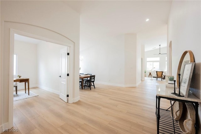 4065 Genoa Dr, Las Vegas, NV 89141 - corridor featuring light wood-type flooring, lofted ceiling, recessed lighting, and an office area