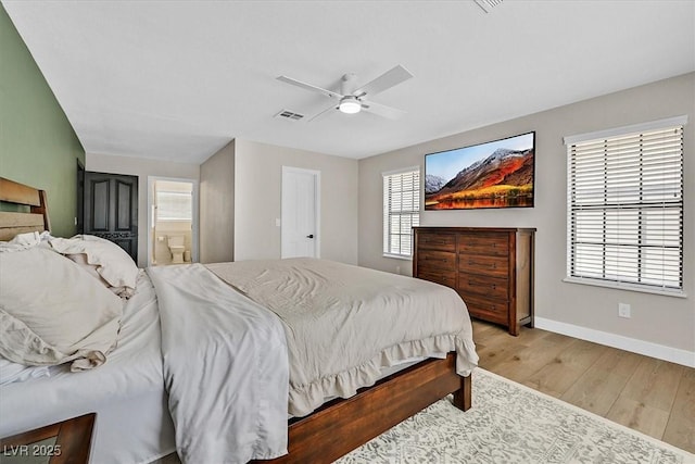 2740 Family Ct, Las Vegas, NV 89117 - bedroom featuring light wood-type flooring, ensuite bathroom, and a ceiling fan