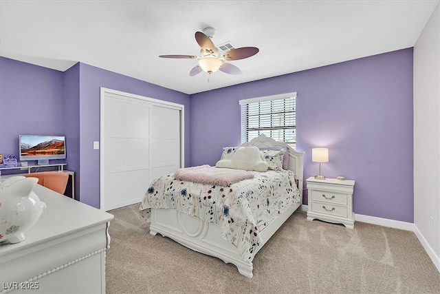 2740 Family Ct, Las Vegas, NV 89117 - bedroom with light carpet, a closet, and a ceiling fan