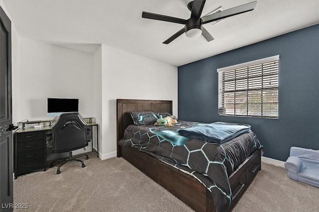 2740 Family Ct, Las Vegas, NV 89117 - bedroom with light carpet, a ceiling fan, and a desk