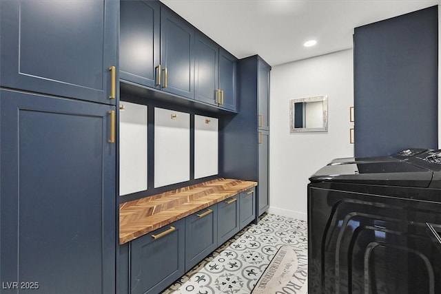 2740 Family Ct, Las Vegas, NV 89117 - laundry room with cabinet space, washing machine and clothes dryer, and recessed lighting