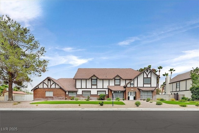 2740 Family Ct, Las Vegas, NV 89117 - tudor house with stucco siding and a tile roof
