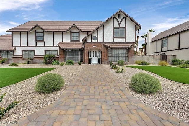 2740 Family Ct, Las Vegas, NV 89117 - tudor house featuring stucco siding and brick siding