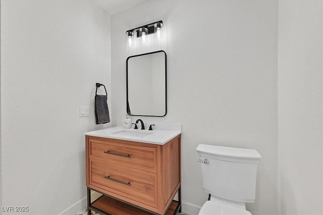 2740 Family Ct, Las Vegas, NV 89117 - half bath featuring baseboards and vanity