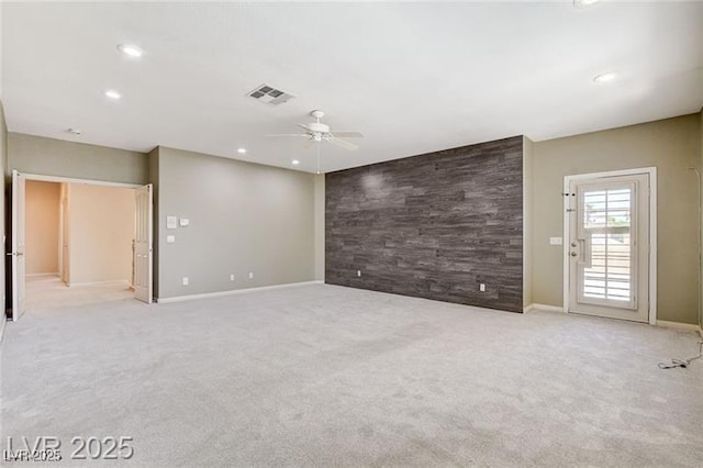 8113 Gothic Ave, Las Vegas, NV 89117 - unfurnished room with ceiling fan, carpet flooring, recessed lighting, and an accent wall