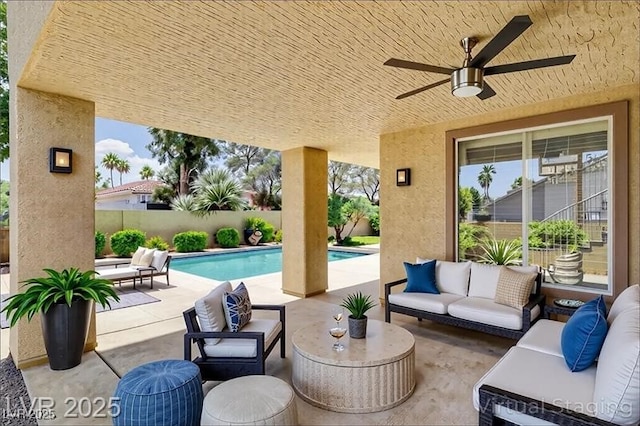 8113 Gothic Ave, Las Vegas, NV 89117 - fenced backyard with an outdoor living space, a patio, and a ceiling fan