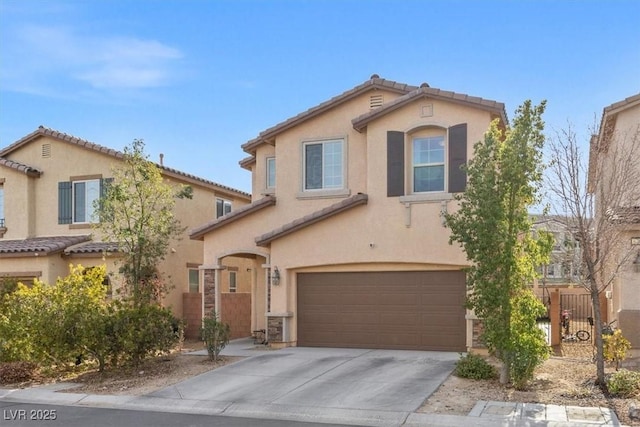 6301 Beavertail Pond Ave, Las Vegas, NV 89122 - view of front of home featuring a garage, stucco siding, driveway, and a tile roof