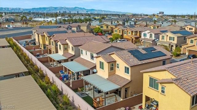 6301 Beavertail Pond Ave, Las Vegas, NV 89122 - aerial perspective of suburban area with a mountainous background