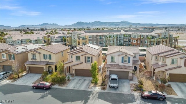 6301 Beavertail Pond Ave, Las Vegas, NV 89122 - aerial view of residential area featuring a mountainous background