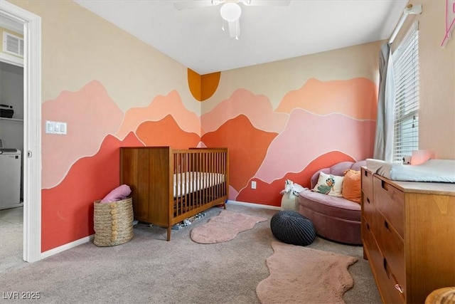 6301 Beavertail Pond Ave, Las Vegas, NV 89122 - carpeted bedroom featuring a crib and a ceiling fan