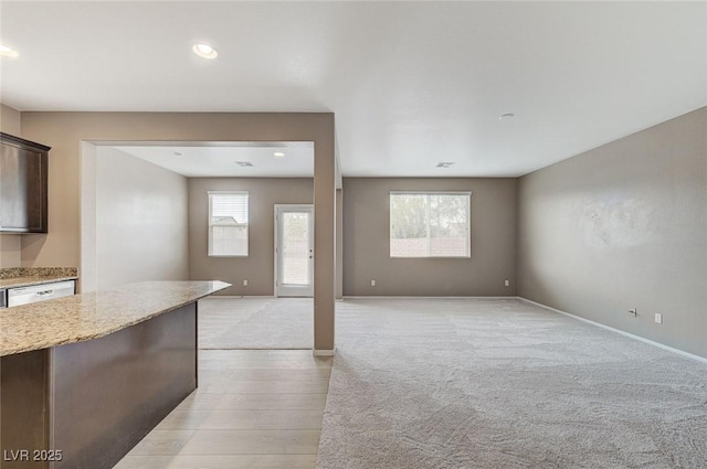7534 Earnshaw Ave, Las Vegas, NV 89179 - unfurnished living room with light colored carpet and recessed lighting