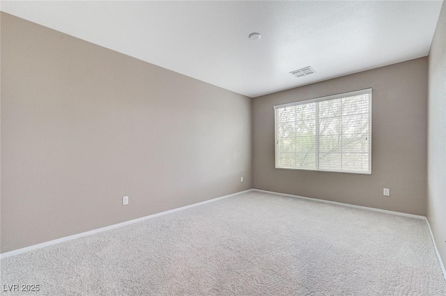 7534 Earnshaw Ave, Las Vegas, NV 89179 - unfurnished room with baseboards and carpet