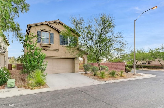 7534 Earnshaw Ave, Las Vegas, NV 89179 - traditional-style home featuring a garage, stucco siding, concrete driveway, and a tile roof