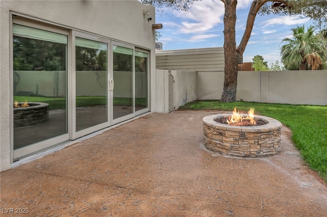 7045 Edna Ave, Las Vegas, NV 89117 - view of patio featuring a fire pit and french doors
