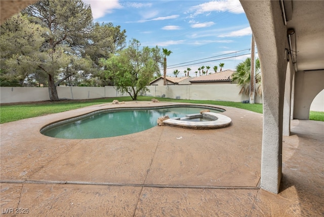 7045 Edna Ave, Las Vegas, NV 89117 - view of swimming pool with a patio, a fenced backyard, and a pool with connected hot tub