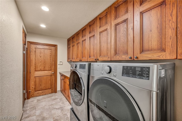 7045 Edna Ave, Las Vegas, NV 89117 - washroom featuring washing machine and dryer, cabinet space, and recessed lighting