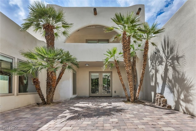 7045 Edna Ave, Las Vegas, NV 89117 - property entrance featuring french doors and stucco siding