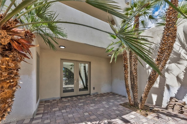 7045 Edna Ave, Las Vegas, NV 89117 - entrance to property with french doors and stucco siding