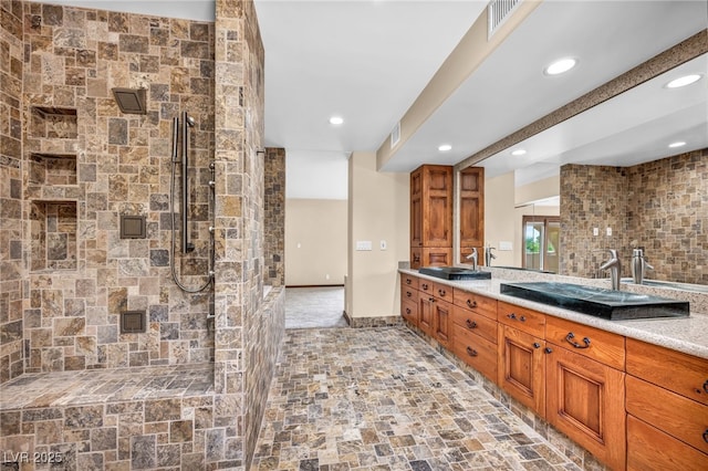 7045 Edna Ave, Las Vegas, NV 89117 - full bathroom with double vanity, recessed lighting, and tiled shower