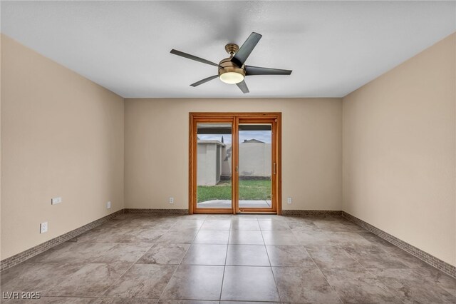 7045 Edna Ave, Las Vegas, NV 89117 - unfurnished room with ceiling fan and baseboards
